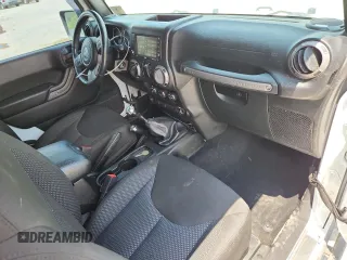 2016 Jeep Wrangler Black Bear with VIN 1C4AJWAG5GL151537, listed as a Copart auction lot 62665455 with 93,537 mi miles and Salvage title. Bid and sale history available at DreamBid. Image 8.