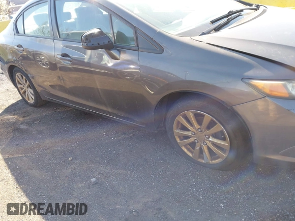2012 Honda Civic EX with VIN 19XFB2F8XCE035220, listed as a IAAI auction lot 41993569 with 199,672 mi miles and . Bid and sale history available at DreamBid. Image 18.