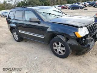 2010 Jeep Grand Cherokee Laredo with VIN 1J4PS4GK7AC117852, listed as a Copart auction lot 89107185 with 167,357 mi miles and Salvage Title. Bid and sale history available at carsss.com. Image 4.