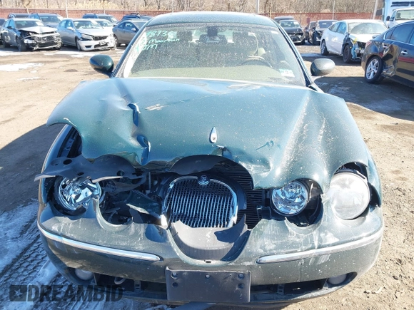 2005 Jaguar S-Type with VIN SAJWA01T95FN51551, listed as a IAAI auction lot 41637854 with 90,075 mi miles and . Bid and sale history available at DreamBid. Image 6.