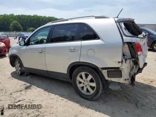 2013 Kia Sorento LX with VIN 5XYKT4A20DG323200, listed as a Copart auction lot 61738005 with 205,312 mi miles and Salvage title. Bid and sale history available at DreamBid. Image 2.