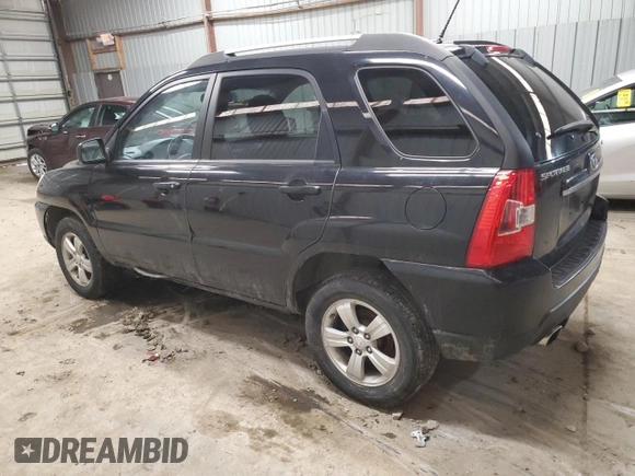 2009 Kia Sportage LX with VIN KNDJF724597564338, listed as a Copart auction lot 44123195 with 113,132 mi miles and Salvage Title. Bid and sale history available at carsss.com. Image 2.