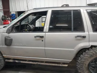 1998 Jeep Grand Cherokee Laredo with VIN 1J4GZ48Y9WC206957, listed as a IAAI auction lot 41848433 with 122,104 mi miles. Bid and sale history available at carsss.com. Image 14.