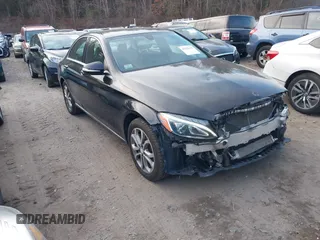 2015 Mercedes-Benz C C 300 Luxury with VIN 55SWF4KB3FU033999, listed as a IAAI auction lot 41352166 with 122,119 mi miles. Bid and sale history available at carsss.com. Image 1.