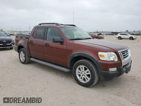 2010 Ford Explorer Sport Trac XLT z VIN 1FMEU3BE2AUF07380, wystawiony jako Copart lot #52099905 z przebiegiem 149 856 mil mil oraz Szkody całkowita. Historia ofert i sprzedaży dostępna na DreamBid. Obrazek 4.