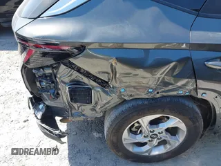 2022 Hyundai Tucson SEL with VIN 5NMJB3AEXNH144592, listed as a IAAI auction lot 42037487 with 75,651 mi miles and . Bid and sale history available at DreamBid. Image 6.