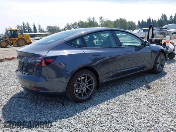 2023 Tesla Model 3 with VIN 5YJ3E1EA6PF664045, listed as a IAAI auction lot 42561039 with 18,708 mi miles and . Bid and sale history available at DreamBid. Image 4.