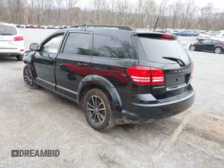 2018 Dodge Journey SE with VIN 3C4PDCAB8JT448530, listed as a IAAI auction lot 41942261 with 86,055 mi miles and . Bid and sale history available at carsss.com. Image 3.