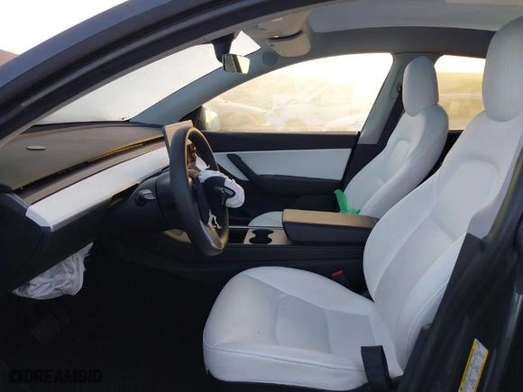 2021 Tesla Model Y Standard Range with VIN 5YJYGDED4MF121963, listed as a IAAI auction lot 41490477 with 41,941 mi miles. Bid and sale history available at carsss.com. Image 5.