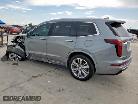 2024 Cadillac XT6 FWD Premium Luxury with VIN 1GYKPCRS7RZ704046, listed as a Copart auction lot 62534055 with 25,644 mi miles and Salvage title. Bid and sale history available at DreamBid. Image 2.