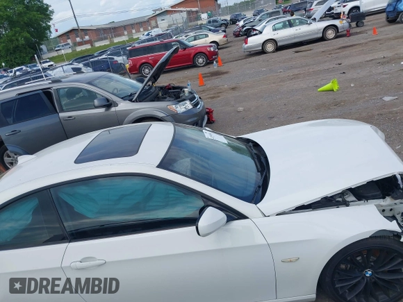 2011 BMW 3 Series 335i with VIN WBAKG7C56BE598702, listed as a IAAI auction lot 42159394 with Not provided miles and . Bid and sale history available at DreamBid. Image 14.