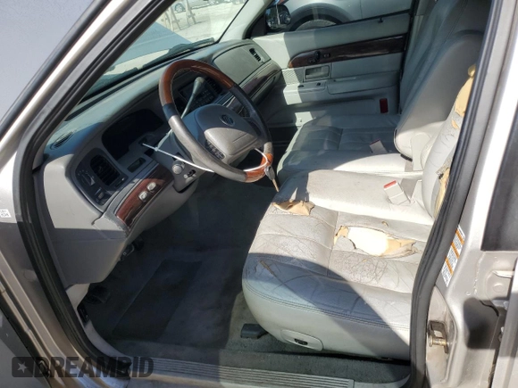 2003 Mercury Grand Marquis LS Premium with VIN 2MEHM75W63X697725, listed as a Copart auction lot 54485505 with 129,194 mi miles and Salvage Title. Bid and sale history available at DreamBid. Image 7.