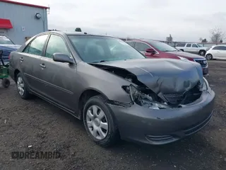 2004 Toyota Camry LE z VIN 4T1BE32K84U879705, wystawiony jako IAAI lot #41079492 z przebiegiem 233 504 mil mil oraz . Historia ofert i sprzedaży dostępna na DreamBid. Obrazek 1.