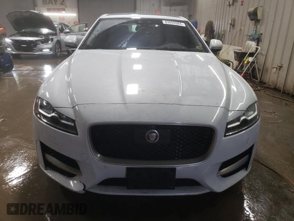 2016 Jaguar XF with VIN SAJBL4BV5GCY00349, listed as a Copart auction lot 83692684 with 71,741 mi miles and Salvage Title. Bid and sale history available at DreamBid. Image 5.