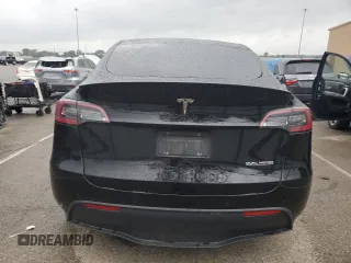 2022 Tesla Model Y Performance с VIN 7SAYGDEF5NF554018, выставлен на аукционе Copart как лот 65062185 с пробегом Не указан миль и Списание • Salvage title. История ставок и продаж доступна на DreamBid. Изображение 6.