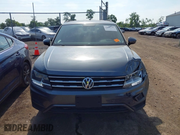 2018 Volkswagen Tiguan S with VIN 3VV0B7AX5JM108306, listed as a IAAI auction lot 42741783 with 71,040 mi miles and . Bid and sale history available at DreamBid. Image 12.