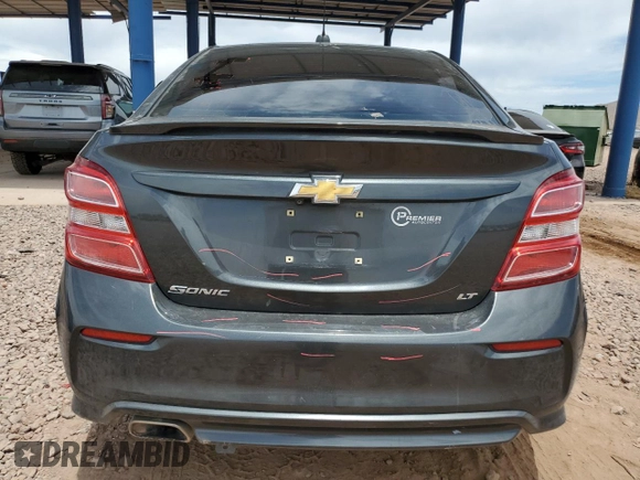 2017 Chevrolet Sonic LT with VIN 1G1JD5SG1H4103649, listed as a Copart auction lot 58536765 with 128,562 mi miles and Salvage title. Bid and sale history available at DreamBid. Image 6.