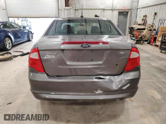 2010 Ford Fusion SE with VIN 3FAHP0HA5AR128799, listed as a Copart auction lot 59311905 with 107,903 mi miles and Non repairable. Bid and sale history available at DreamBid. Image 6.