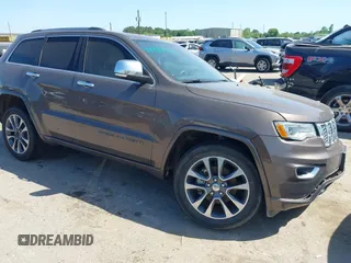 2018 Jeep Grand Cherokee High Altitude z VIN 1C4RJECG9JC125556, wystawiony jako IAAI lot #41989339 z przebiegiem 174 739 mil mil oraz . Historia ofert i sprzedaży dostępna na DreamBid. Obrazek 1.