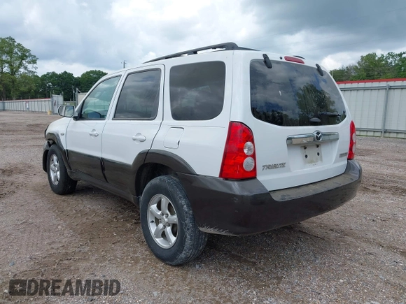 2006 Mazda Tribute i with VIN 4F2YZ02Z56KM31953, listed as a IAAI auction lot 42167223 with 185,169 mi miles and . Bid and sale history available at carsss.com. Image 3.