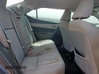 2016 Toyota Corolla L z VIN 5YFBURHE7GP485545, wystawiony jako Copart lot #58166915 z przebiegiem 102 557 mil mil oraz Szkoda całkowita • Salvage title. Historia ofert i sprzedaży dostępna na DreamBid. Obrazek 10.