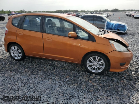 2011 Honda Fit Sport with VIN JHMGE8H59BC007883, listed as a Copart auction lot 54194635 with 123,256 mi miles and Salvage Title. Bid and sale history available at DreamBid. Image 4.