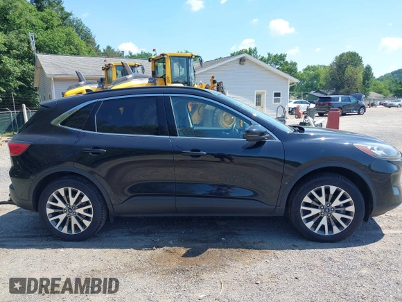 2020 Ford Escape Titanium with VIN 1FMCU9J92LUA27373, listed as a IAAI auction lot 42650077 with 42,179 mi miles and . Bid and sale history available at DreamBid. Image 14.