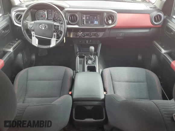 2018 Toyota Tacoma SR z VIN 3TMCZ5AN2JM138146, wystawiony jako Copart lot #60031945 z przebiegiem 63 151 mil mil oraz Szkoda całkowita • Salvage title. Historia ofert i sprzedaży dostępna na DreamBid. Obrazek 8.