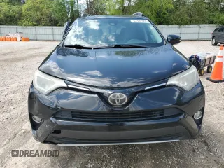 2018 Toyota RAV4 XLE with VIN 2T3RFREV7JW697470, listed as a Copart auction lot 52192305 with 109,420 mi miles and Salvage Title. Bid and sale history available at carsss.com. Image 5.