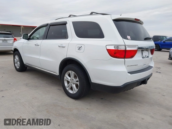2013 Dodge Durango Crew with VIN 1C4RDHDG5DC617061, listed as a IAAI auction lot 41385801 with 142,304 mi miles. Bid and sale history available at carsss.com. Image 3.