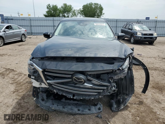 2019 Mazda CX-9 Touring with VIN JM3TCBCY4K0300233, listed as a Copart auction lot 59424225 with 50,337 mi miles and Salvage title. Bid and sale history available at DreamBid. Image 5.