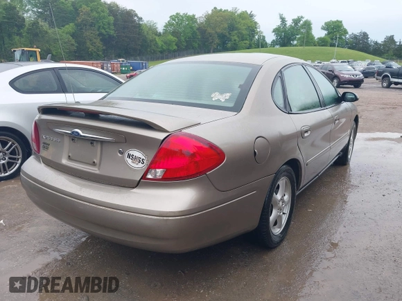 2002 Ford Taurus SES Standard with VIN 1FAFP55S42A248753, listed as a IAAI auction lot 42112264 with 219,560 mi miles. Bid and sale history available at carsss.com. Image 4.