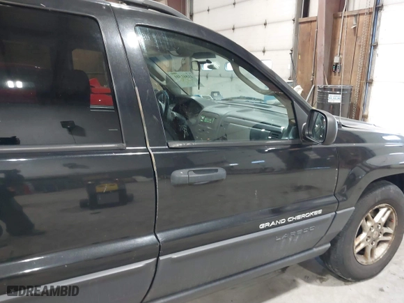 2003 Jeep Grand Cherokee Laredo with VIN 1J4GW48S63C552366, listed as a IAAI auction lot 41861501 with 227,464 mi miles. Bid and sale history available at carsss.com. Image 15.