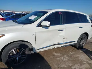 2016 Infiniti QX60 with VIN 5N1AL0MN7GC507726, listed as a IAAI auction lot 41754036 with 167,213 mi miles. Bid and sale history available at carsss.com. Image 6.