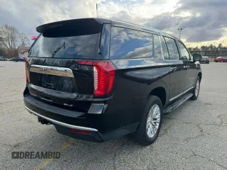 2021 GMC Yukon XL SLT with VIN 1GKS2GKDXMR238116, listed as a Copart auction lot 83266714 with 106,975 mi miles and Clean Title. Bid and sale history available at carsss.com. Image 4.