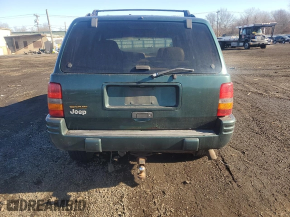 1998 Jeep Grand Cherokee Laredo with VIN 1J4GZ48S4WC239246, listed as a Copart auction lot 86101204 with 0 mi miles and Salvage Title. Bid and sale history available at carsss.com. Image 6.
