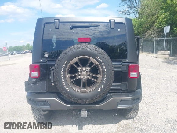 2016 Jeep Wrangler Unlimited Sahara with VIN 1C4BJWEG8GL253803, listed as a IAAI auction lot 42296118 with 163,463 mi miles and . Bid and sale history available at DreamBid. Image 16.