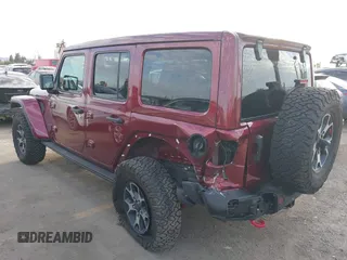 2021 Jeep Wrangler Unlimited Rubicon z VIN 1C4HJXFG0MW575473, wystawiony jako IAAI lot #41681352 z przebiegiem 54 968 mil mil oraz . Historia ofert i sprzedaży dostępna na DreamBid. Obrazek 3.