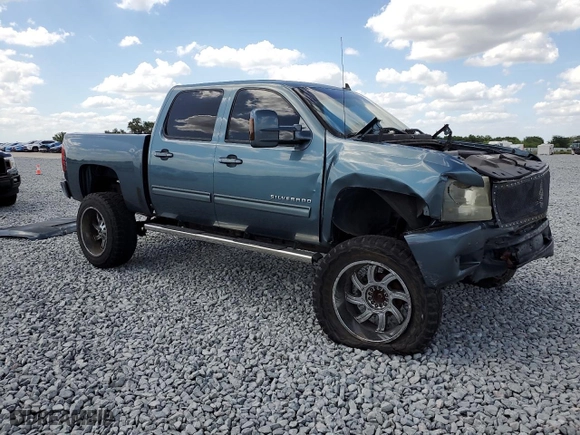 2009 Chevrolet Silverado 1500 LTZ with VIN 3GCEK33349G288587, listed as a Copart auction lot 52028095 with 123,469 mi miles and Clean Title. Bid and sale history available at carsss.com. Image 4.