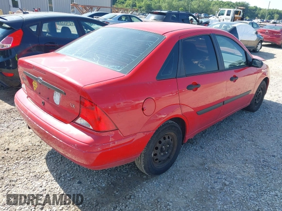 2000 Ford Focus LX with VIN 1FAFP33PXYW413249, listed as a IAAI auction lot 42561661 with 253,875 mi miles and . Bid and sale history available at DreamBid. Image 4.