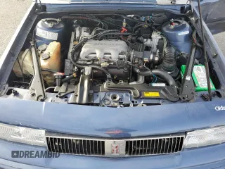 1994 Oldsmobile Cutlass Ciera S z VIN 1G3AG55M3R6436697, wystawiony jako Copart lot #79562944 z przebiegiem 118 629 mil mil oraz Szkody całkowita. Historia ofert i sprzedaży dostępna na DreamBid. Obrazek 12.