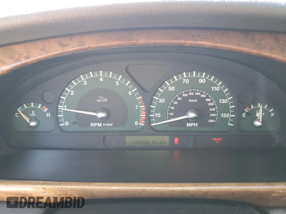 2003 Jaguar S-Type z VIN SAJEA01U73HM89587, wystawiony jako Copart lot #45712745 z przebiegiem 45 916 mil mil oraz Tytuł czysty. Historia ofert i sprzedaży dostępna na DreamBid. Obrazek 9.