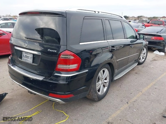 2012 Mercedes-Benz GL-Class GL 450 with VIN 4JGBF7BE7CA795275, listed as a IAAI auction lot 41274429 with 141,818 mi miles. Bid and sale history available at carsss.com. Image 4.