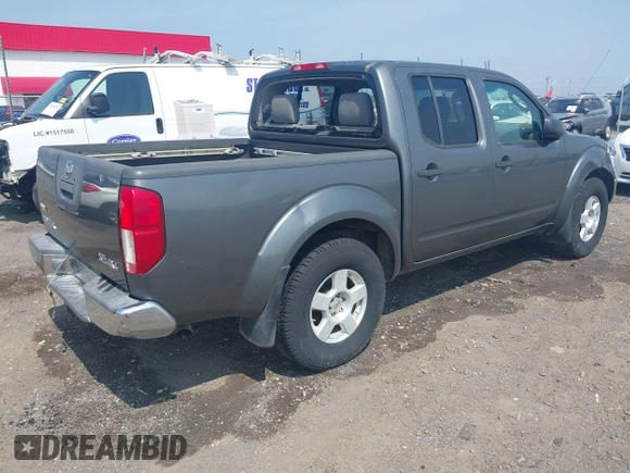 2005 Nissan Frontier LE with VIN 1N6AD07W35C438405, listed as a IAAI auction lot 42469804 with 128,472 mi miles and . Bid and sale history available at DreamBid. Image 4.
