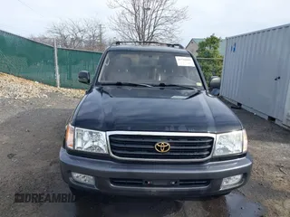 1998 Toyota Land Cruiser with VIN JT3HT05J2W0017214, listed as a IAAI auction lot 41716028 with 214,047 mi miles. Bid and sale history available at carsss.com. Image 13.