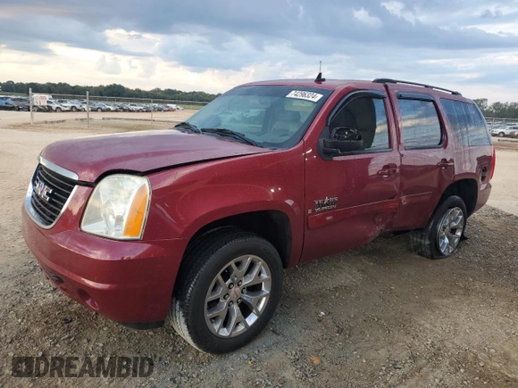2007 GMC Yukon SLT with VIN 1GKFC13J77R240748, listed as a Copart auction lot 74296324 with 239,410 mi miles and Salvage Title. Bid and sale history available at carsss.com. Image 1.