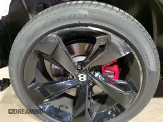 2020 Bentley Bentayga V8 z VIN SJAAM2ZV9LC031383, wystawiony jako Copart lot #74666394 z przebiegiem 30 830 mil mil oraz Szkoda całkowita • Salvage title. Historia ofert i sprzedaży dostępna na DreamBid. Obrazek 13.
