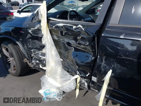 2015 Audi Q7 S line Prestige with VIN WA1DGAFE2FD014905, listed as a IAAI auction lot 42790841 with 111,992 mi miles and . Bid and sale history available at DreamBid. Image 12.
