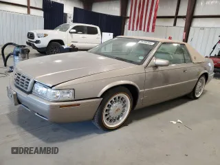 2000 Cadillac Eldorado Touring ETC z VIN 1G6ET1298YB703928, wystawiony jako Copart lot #75795384 z przebiegiem 152 216 mil mil oraz Szkoda całkowita • Salvage title. Historia ofert i sprzedaży dostępna na DreamBid. Obrazek 1.