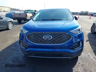 2024 Ford Edge SEL z VIN 2FMPK4J96RBA12822, wystawiony jako IAAI lot #41940628 z przebiegiem 8 981 mil mil oraz . Historia ofert i sprzedaży dostępna na DreamBid. Obrazek 13.